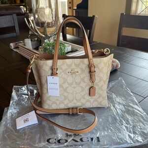 Brand new Coach Mollie 25